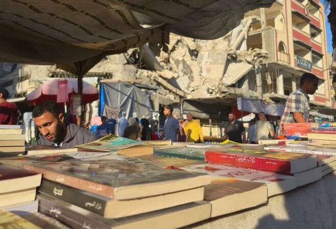 A book stall in the rubble nourishes hungry minds