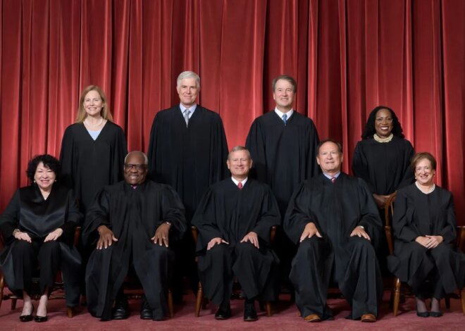 Nine Justices in Black Who Rule White