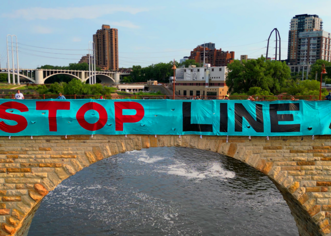 Activists Drop ‘Stop Line 5’ Banner From Stone Arch Bridge, Urge Michigan to Block Enbridge Line 5 Tunnel Permits